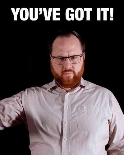A Man With Glasses And A Beard Stands In Front Of A Black Background With The Words You 'Ve Got It GIF