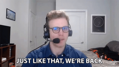 Man With Glasses And Headset Says We're Back GIF