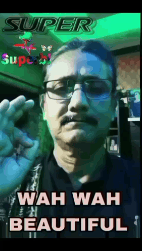 A Man With Glasses And A Mustache Is Giving An Ok Sign GIF