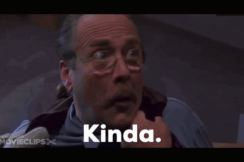 A Man With Glasses And A Mustache Is Smiling And The Word Kinda Is On The Screen GIF
