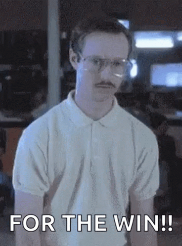 A Man With Glasses And A Mustache Is Standing In Front Of A Wall And Saying `` For The Win ! '' GIF