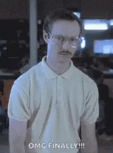 A Man With Glasses And A Mustache Is Wearing A White Polo Shirt And A White Shirt . GIF