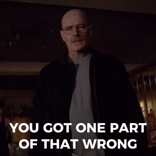 A Man With Glasses And A Mustache Pointing Up With The Words You Got One Part Of That Wrong Behind Him GIF