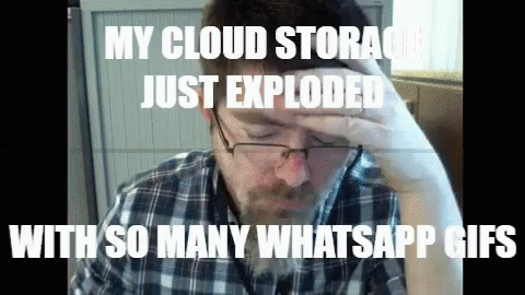 A Man With Glasses And A Plaid Shirt Holds His Hand To His Forehead With The Caption " My Cloud Storage Just Exploded GIF