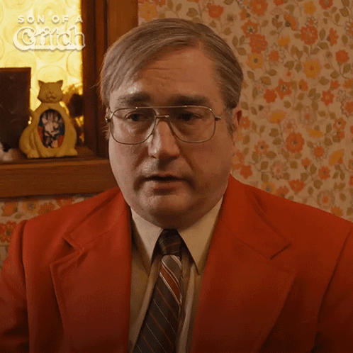 A Man With Glasses And A Red Suit Says I Got Fired GIF
