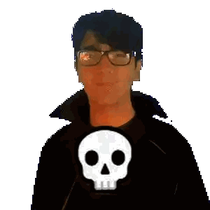 a man with glasses and a skull in front of his face