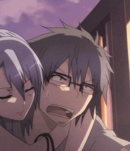 A Man With Glasses And A Woman With Blue Hair Are Hugging GIF