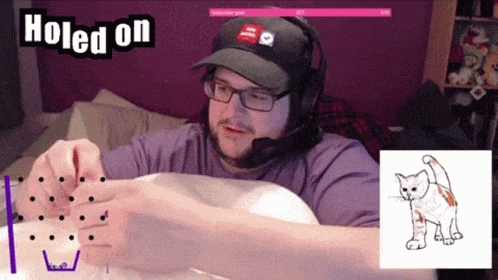 A Man With Glasses And Headphones Is Playing A Game With The Words " Holed On " On The Bottom GIF