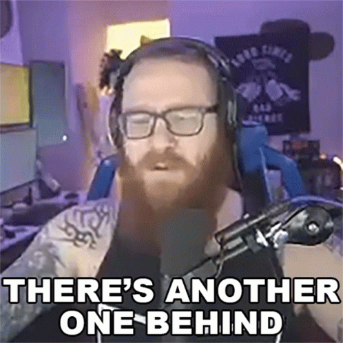 a man with glasses and headphones says there 's another one-behind