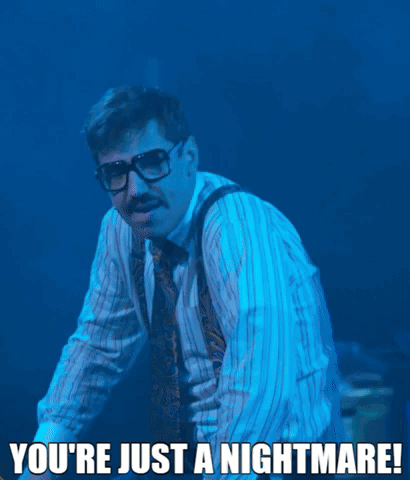 A Man With Glasses And Suspenders Says " You 'Re Just A Nightmare ! " GIF