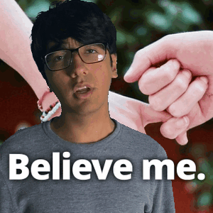 A Man With Glasses And The Words Believe Me Written On His Shirt GIF