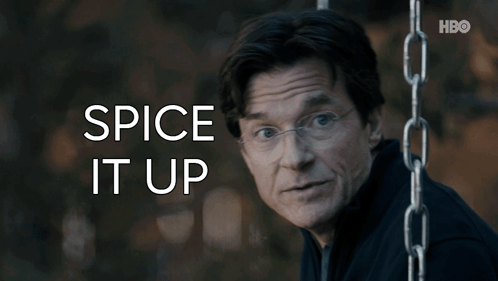 A Man With Glasses And The Words Spice It Up In Front Of Him GIF