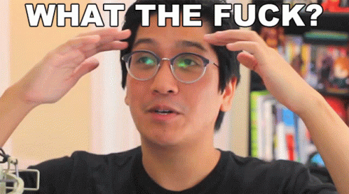 A Man With Glasses Has His Hands On His Head And The Words What The Fuck Are Above Him GIF