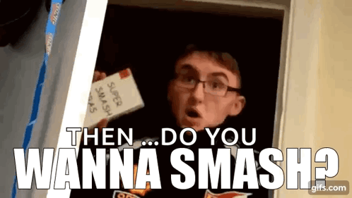 A Man With Glasses Is Holding A Piece Of Paper That Says Super Smash Bros . GIF