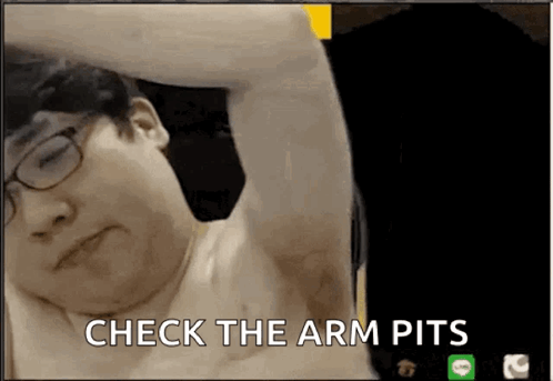 A Man With Glasses Is Laying Down And The Words Check The Arm Pits Are Visible GIF