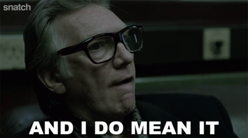 A Man With Glasses Is Screaming With The Words " And I Do Mean It " Below Him GIF