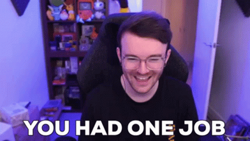 A Man With Glasses Is Sitting In A Chair With The Words `` You Had One Job '' Written On The Screen Behind Him . GIF