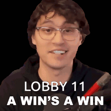 A Man With Glasses Is Smiling With The Words Lobby 11 A Win 'S A Win Below Him GIF