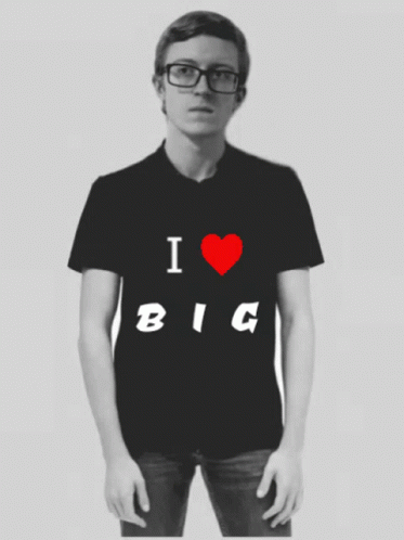 A Man With Glasses Is Wearing A Black Shirt That Says I Love Big GIF
