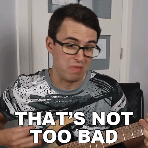 A Man With Glasses Playing A Guitar With The Words That 'S Not Too Bad Above Him GIF