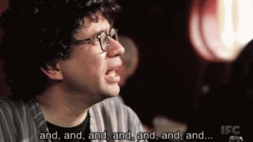 A Man With Glasses Says And And And And And And GIF