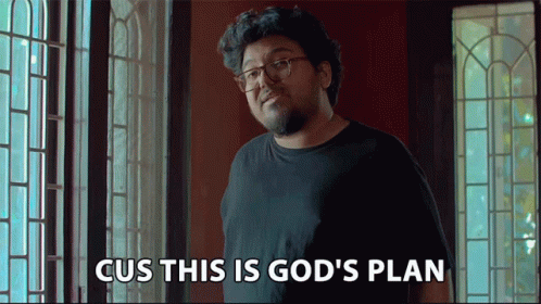 A Man With Glasses Says Cus This Is God 'S Plan While Standing In Front Of A Window GIF