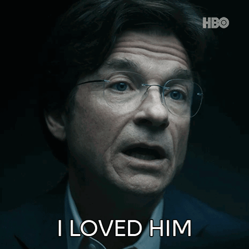 A Man With Glasses Says I Loved Him In A Dark Room GIF