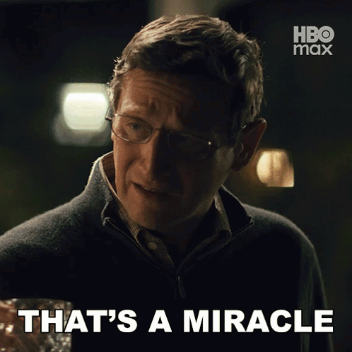 A Man With Glasses Says That 'S A Miracle With A Hbo Max Logo Behind Him GIF