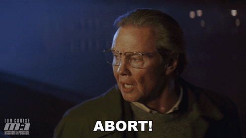 a man with glasses says " that 's an order " in front of him