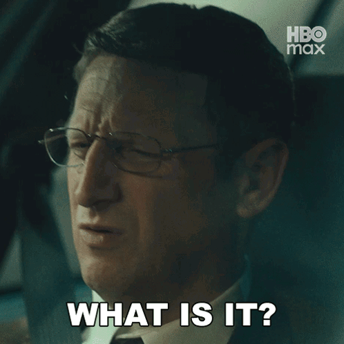 A Man With Glasses Says What Is It In Front Of A Hbo Max Logo GIF