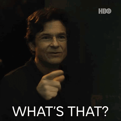 A Man With Glasses Says " What 'S That " While Pointing At Something GIF