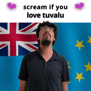A Man With Glasses Stands In Front Of A British Flag And Says Scream If You Love Tuvalu GIF