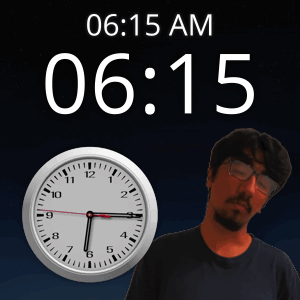 A Man With Glasses Stands In Front Of A Clock That Says 6:15 Am GIF