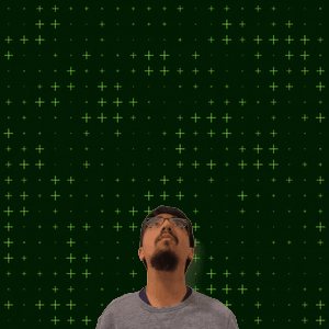 A Man With Glasses Stands In Front Of A Green Background That Says 8 15 GIF