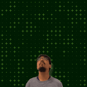 A Man With Glasses Stands In Front Of A Green Background With The Number 14 And 9 GIF