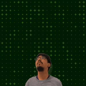 A Man With Glasses Stands In Front Of A Green Background With The Number 15 + 10 GIF