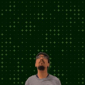 A Man With Glasses Stands In Front Of A Green Background With The Number 15 And 2 GIF