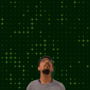 A Man With Glasses Stands In Front Of A Green Background With The Number 20 On It GIF