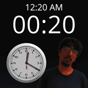 A Man With Glasses Stands Next To A Clock That Says 12:20 Am GIF