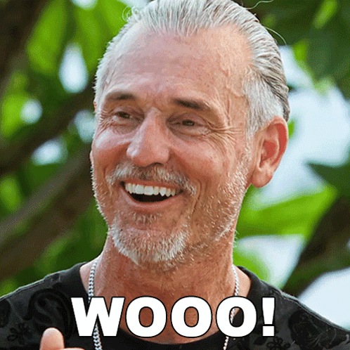 A Man With Gray Hair And A Beard Is Smiling With The Word Wooo Written Below Him GIF