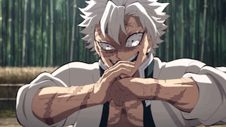 A Man With Gray Hair Is Making A Funny Face With His Hands Folded . GIF