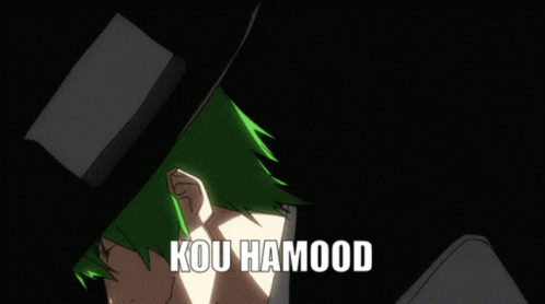 A Man With Green Hair Is Wearing A Black Hat And A White Shirt With The Words Kou Hamood Written On It GIF
