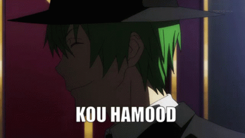 A Man With Green Hair Is Wearing A Black Hat And Has The Word Kou Hamood On His Chest GIF