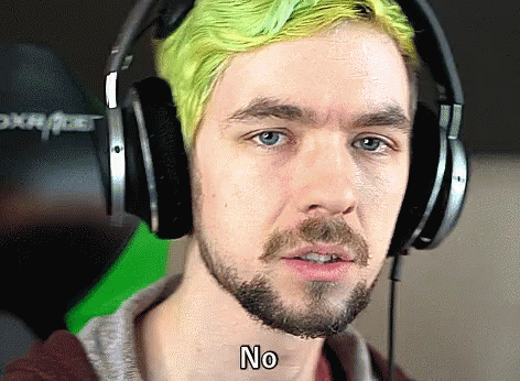 A Man With Green Hair Is Wearing Headphones And Says " No " GIF