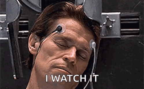 A Man With Headphones On His Head And The Words `` I Watch It '' On The Bottom . GIF