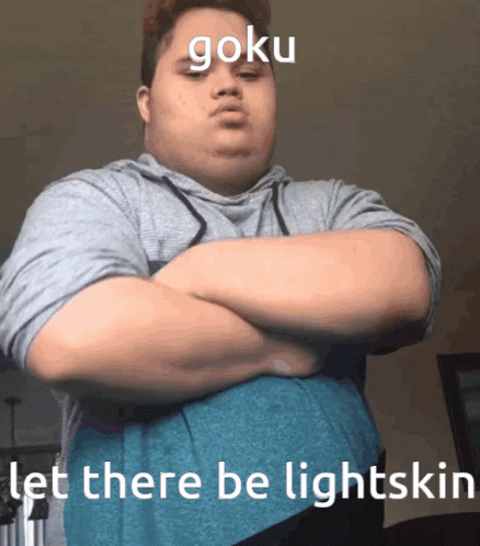 A Man With His Arms Crossed And The Words Goku Let There Be Lightskin GIF