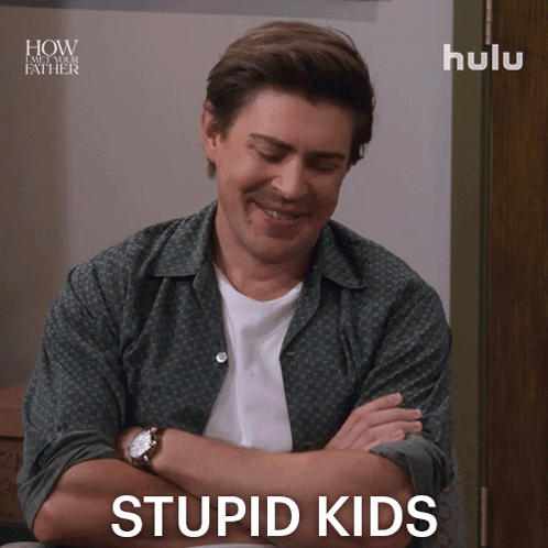 A Man With His Arms Crossed And The Words Stupid Kids On The Bottom GIF