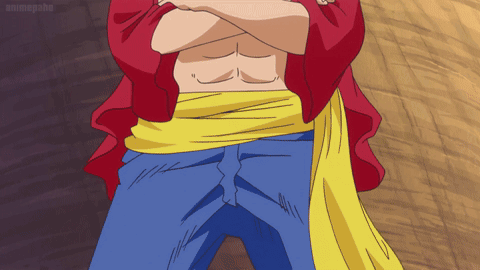 A Man With His Arms Crossed Has A Yellow Sash Around His Waist That Says Animepahe GIF