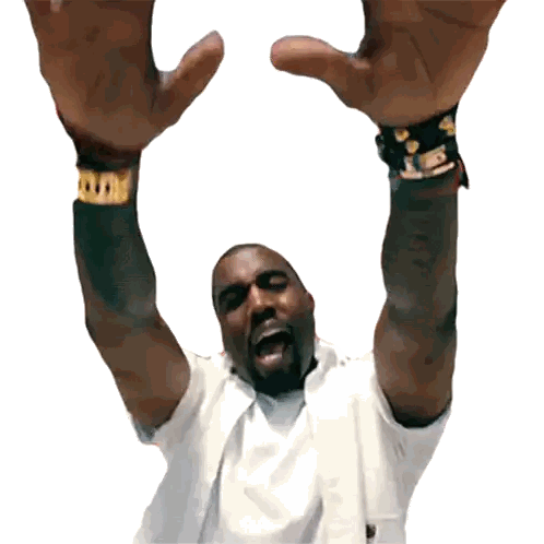 a man with his arms in the air wearing a watch that says cartier
