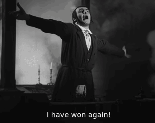 A Man With His Arms Outstretched And The Words I Have Won Again GIF